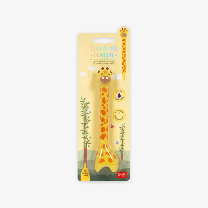 Giraffe-shaped ballpoint pen with base in packaging on a white background