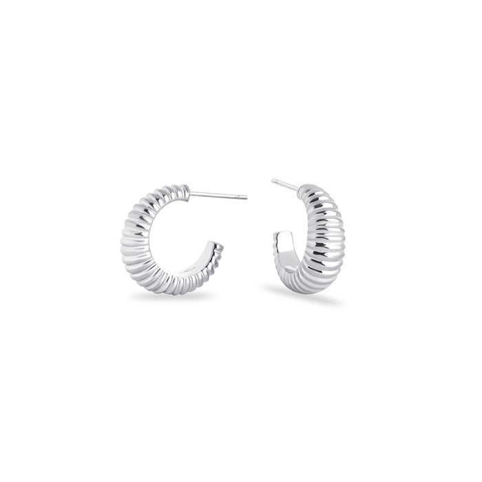 Polished stainless steel hoop earrings with a modern ribbed design for a chic and timeless look. MIAJWL