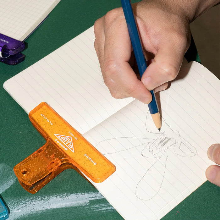 Clip holding a journal