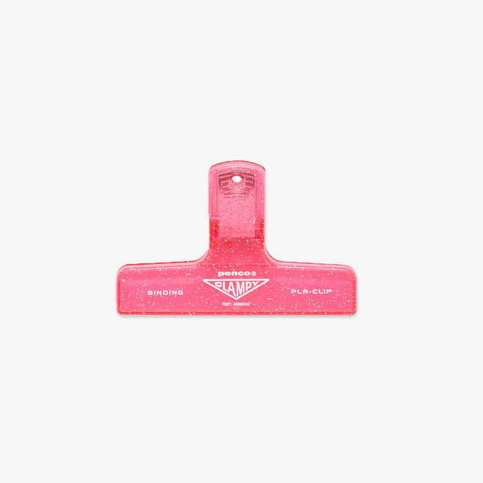 Pink binding clip on a white background