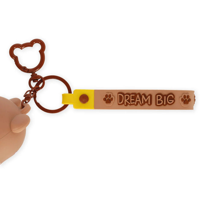Keychain with 'Dream Big' tag and bear-shaped key ring on a white background