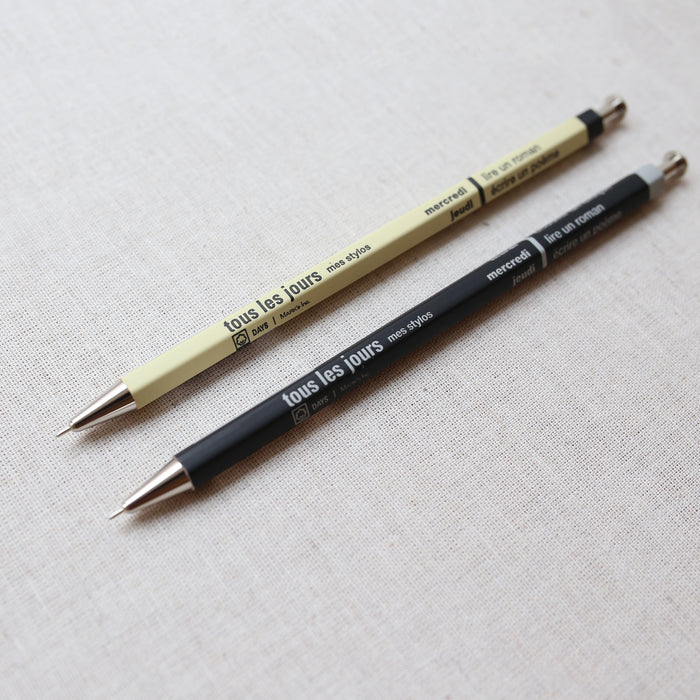 Two ballpoint pens in Black and yellow, made of metal and wood, with a 0.5 mm tip.