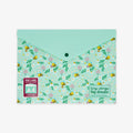 A mint green A4 document folder with a floral and bee pattern on the front, featuring a solid mint green envelope flap and a snap button closure. The brand 'tiny wings big dream' is printed on the lower right, and a red 'Fold & order' sticker is on the lower left, all set against a plain white background.