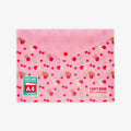 Pink A4 fold & seal document folder with a cute cherry and bear pattern, featuring a red snap button closure and a green 'fold & seal A4' sticker on the lower left.