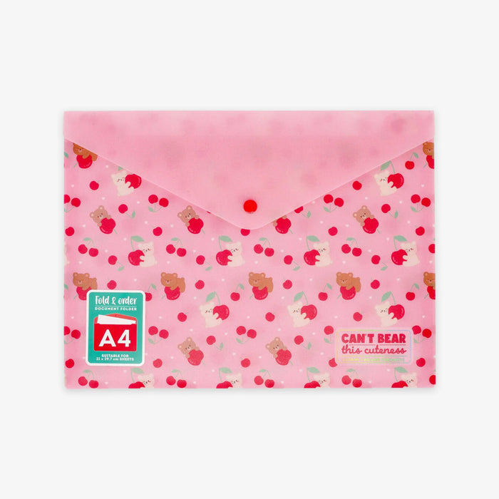 Pink A4 fold & seal document folder with a cute cherry and bear pattern, featuring a red snap button closure and a green 'fold & seal A4' sticker on the lower left.