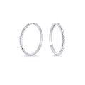 Estelle II Huggie Earrings