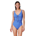 Woman wearing a blue one-piece swimsuit on a white background