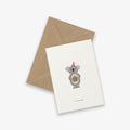 Greeting card with a koala illustration and brown envelope on a white background. Birthday card with the text 'it's your day'