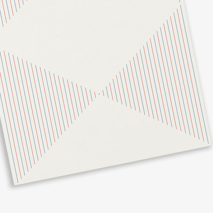 A white greeting card with a pattern of red and blue stripes forming a butterfly motif.