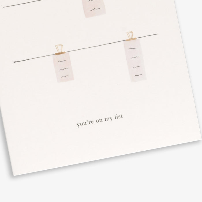 A simple, folded A6 greeting card with a list illustration and te text 'you're on my list'.