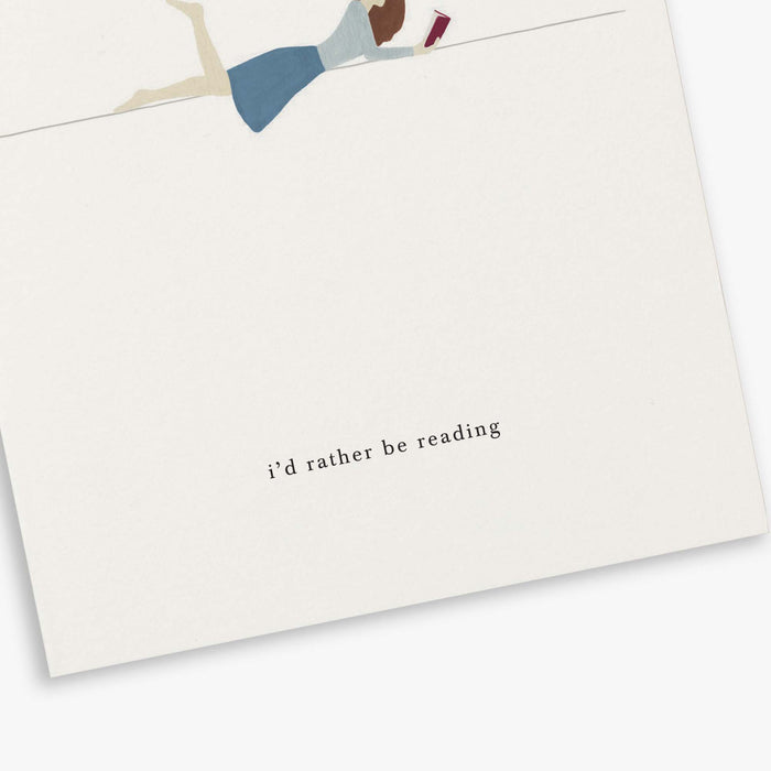 A greeting card with a illustration of a girl reading, accompanied by the text 'i'd rather be reading.'