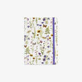 Notebook with floral and butterfly design on a white background