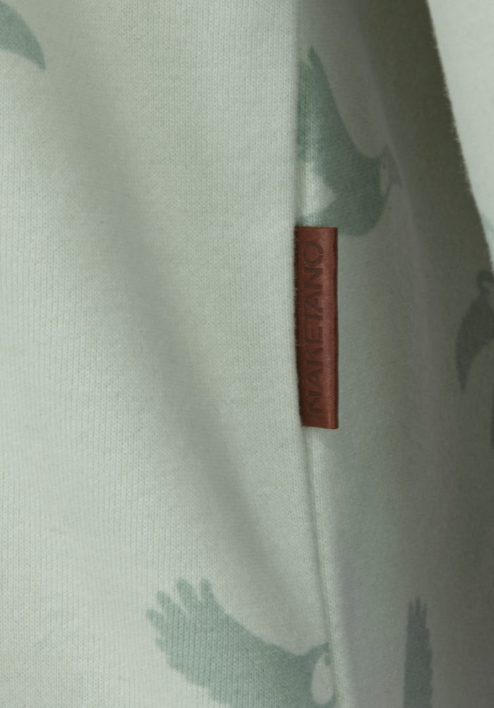 Krokettenhorst 20 - Light Green Melange Allover Birds