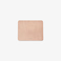 A natural brown leather mouse pad with a minimalist design on a white background.