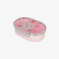 A pink oval lunch box with a clear lid featuring a cartoon cat face and paw prints, shown on a light gray background.