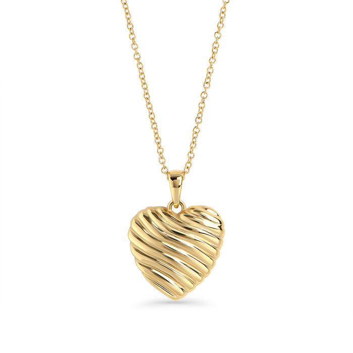Gold stainless steel heart pendant necklace with sculptural ribbed design, bold romantic jewelry, hypoallergenic non-tarnish durable statement necklace, modern elegant heart jewelry.