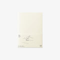 Notebook with minimal design on a light beige background