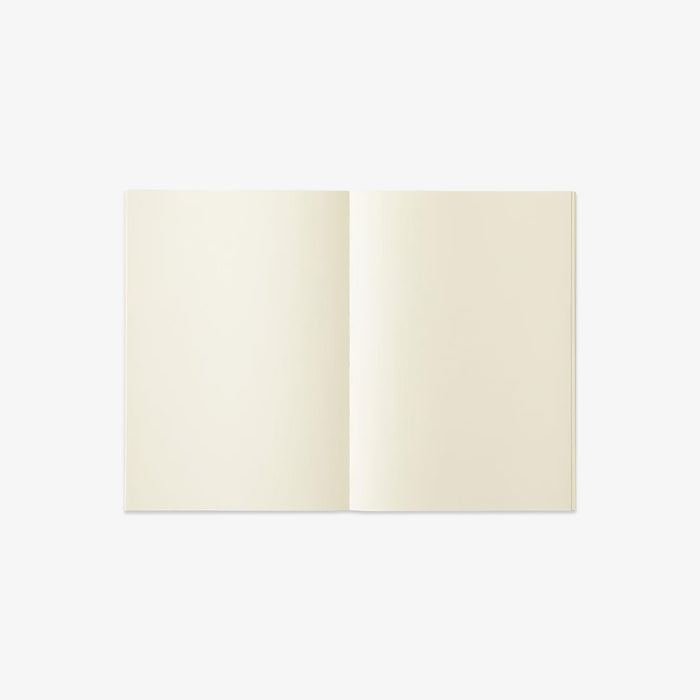Open notebook with cream-colored pages on a white background