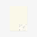 Plain notepad with minimal design on a light gray background