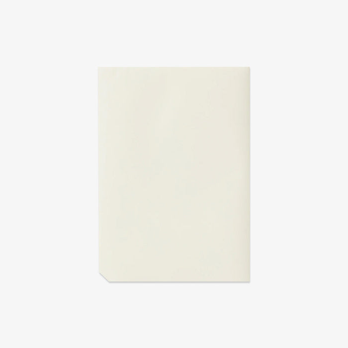 Beige color notepad on a white background