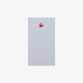 light blue notepad with a pink strawberry on a white background