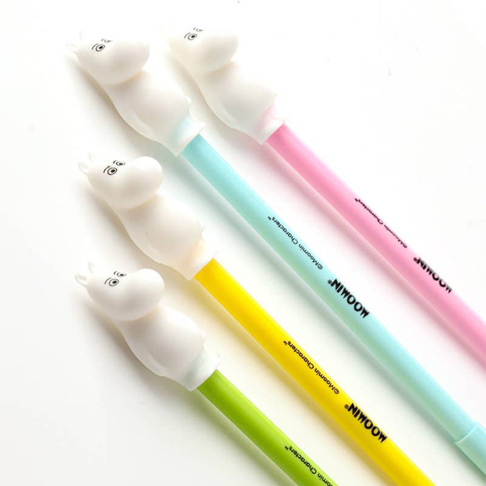Set of four colorful pens with Moomin ends on a white background