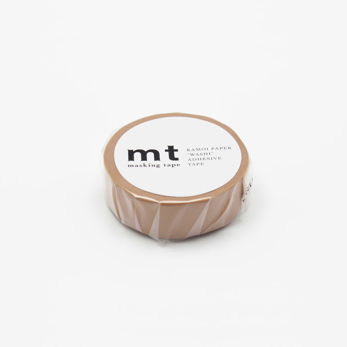 A roll of beige MT masking tape with a paper backing.