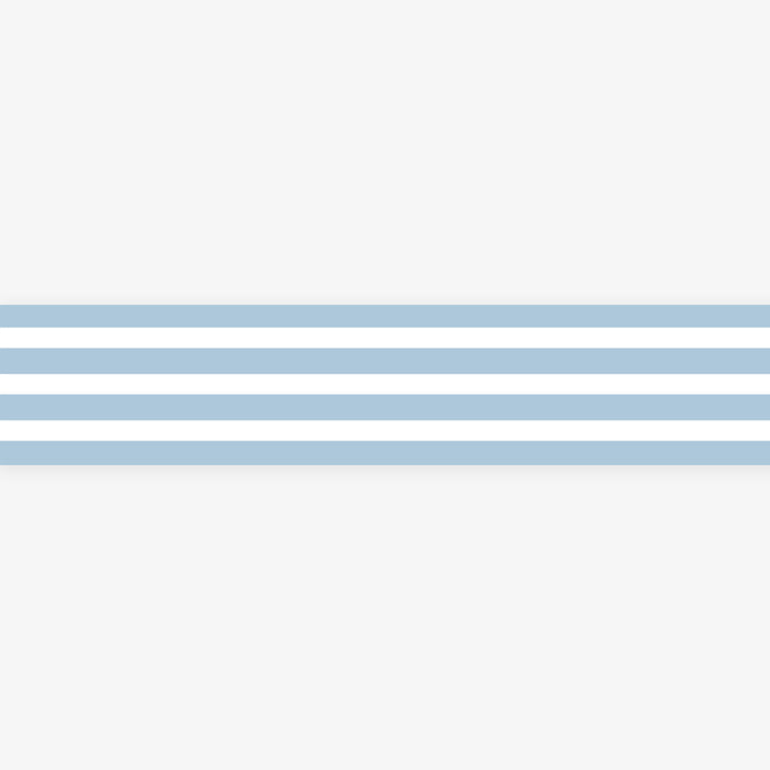 Unrolled masking tape with white and light blue stripes.