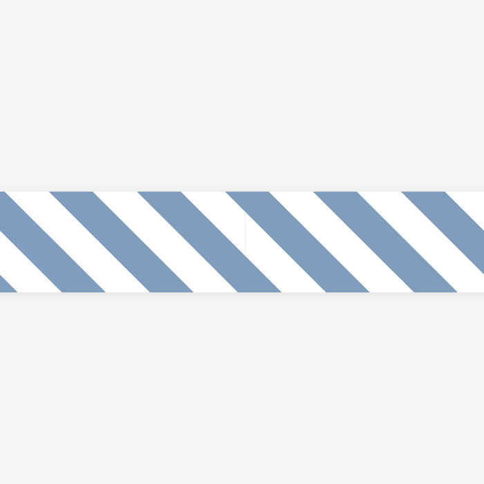 A roll of MT masking tape with a pattern of stripes in varying shades of white and blue.