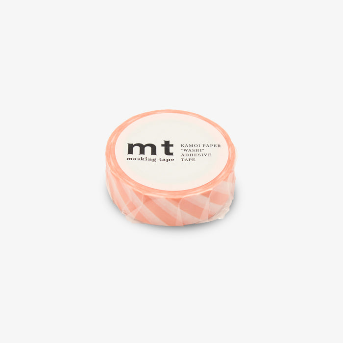A roll of MT masking tape with a pattern of stripes in varying shades of white and orange.