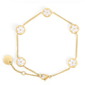 Gold chain bracelet with five round mother-of-pearl flower charms on a white background. Waterproof, stainless steel and allergy free. By Mia Bijoux Canada.

Bracelet à maillons doré orné de cinq pastilles rondes à fleur en nacre sur fond blanc. Résistant à l'eau, en acier inoxydable et hypoallergénique. Par Mia Bijoux Canada.
