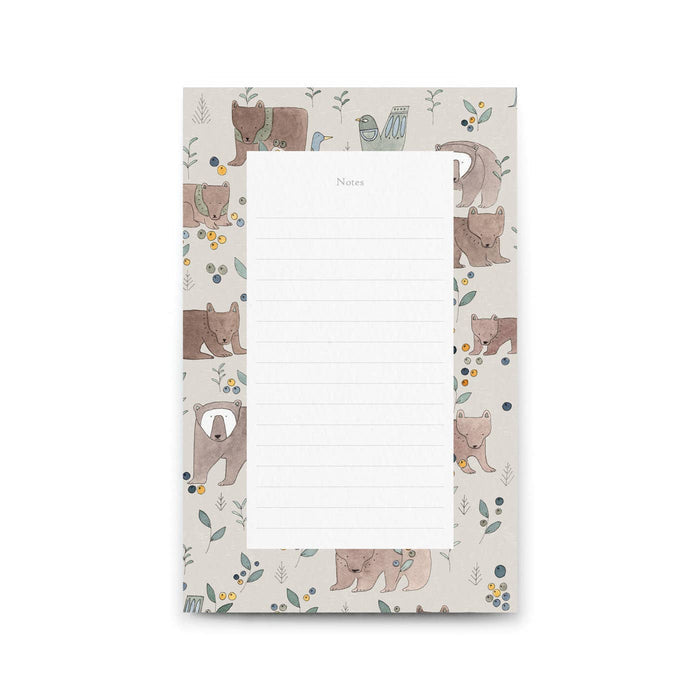Notepad with bear illustrations on a white background