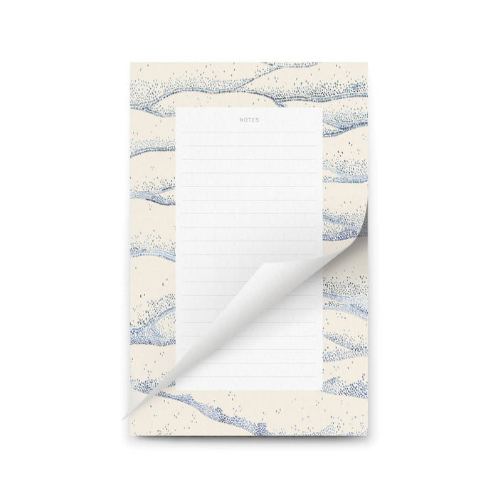 Notepad with a marble design on the cover
