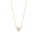 Gold stainless steel necklace with hexagon-cut cubic zirconia pendant, minimalist geometric jewelry design with brilliant stone on delicate chain.