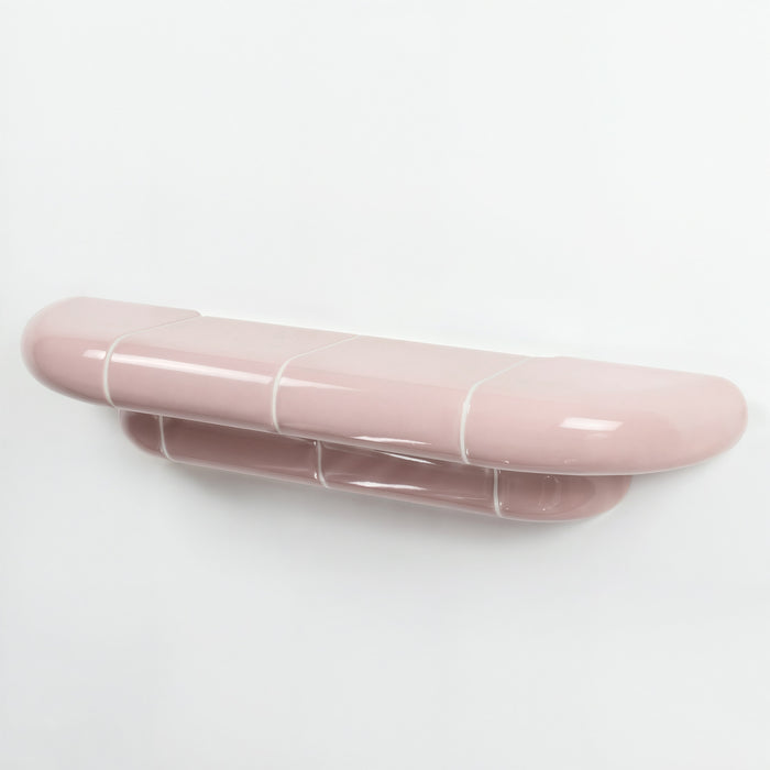 Orbi floating wall shelf in glossy Blush Pink finish, handcrafted in Spain.