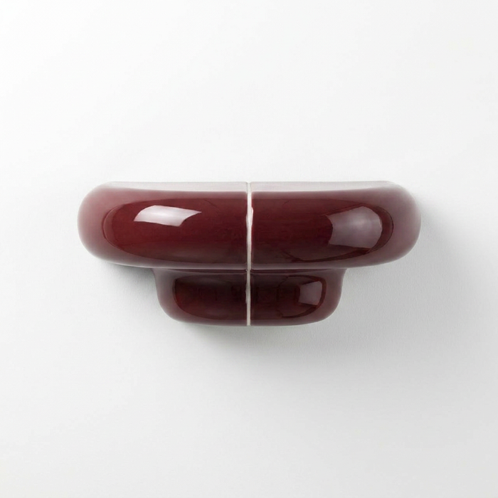 Orbi XS floating shelf in glossy Deep Burgundy, compact handcrafted wall shelf for modern interiors.