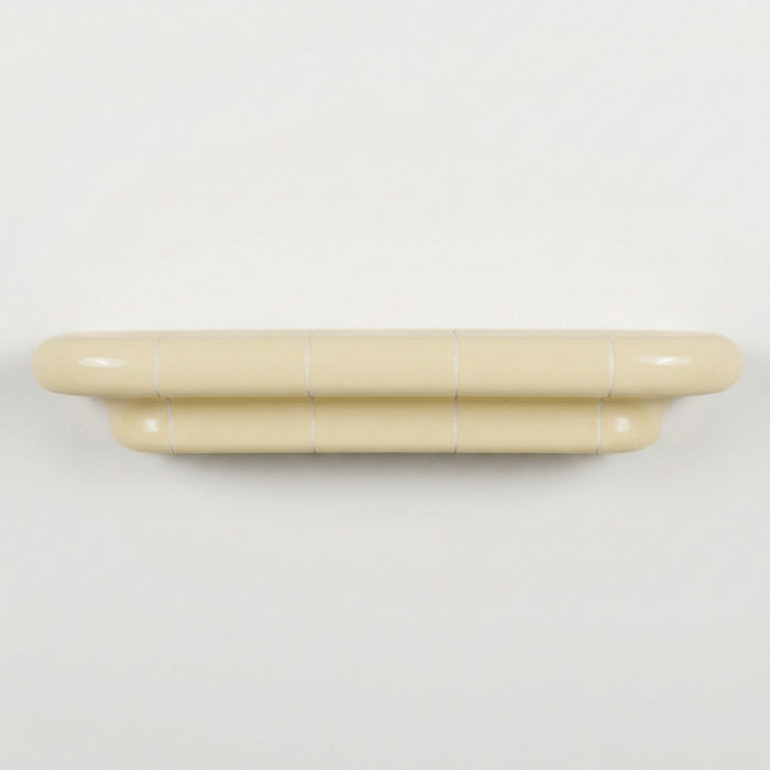 Orbi L contemporary wall shelf in glossy Soft Butter, modular handcrafted design.