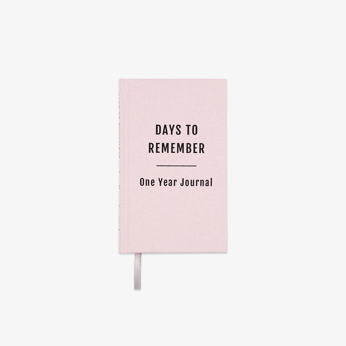 Pink journal titled 'Days to Remember: One Year Journal' on a white background