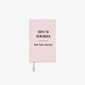 Pink journal titled 'Days to Remember: One Year Journal' on a white background