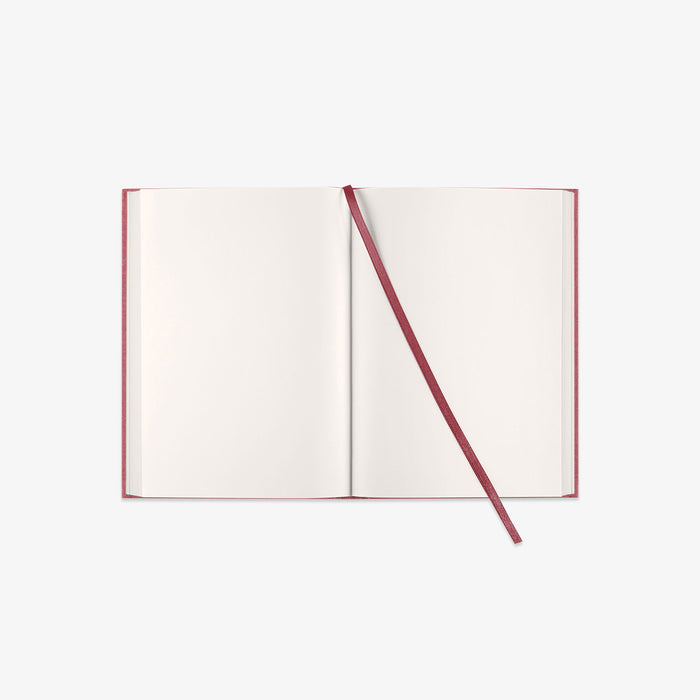 Open notebook with a red BOOKMARK on a white background