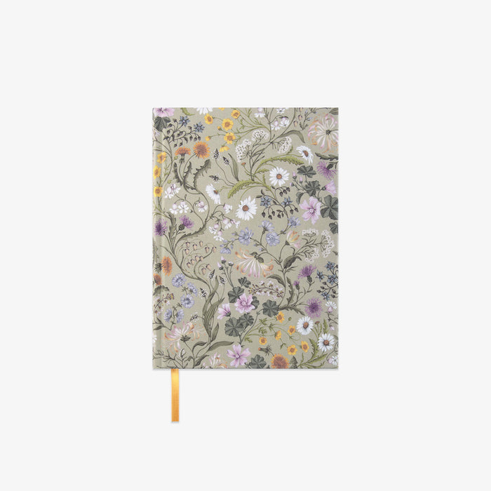 Floral notebook with a yellow ribbon on a white background