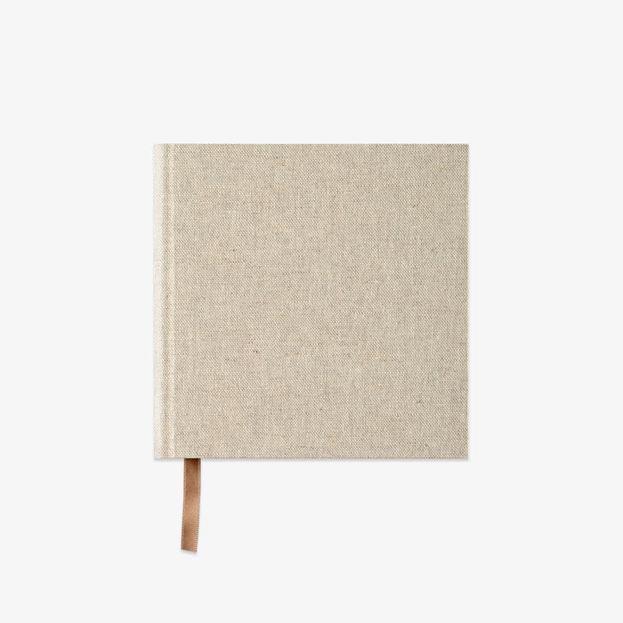 Beige notebook with ribbon bookmark