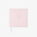 Light pink fabric Notebook with a heart design on a white background