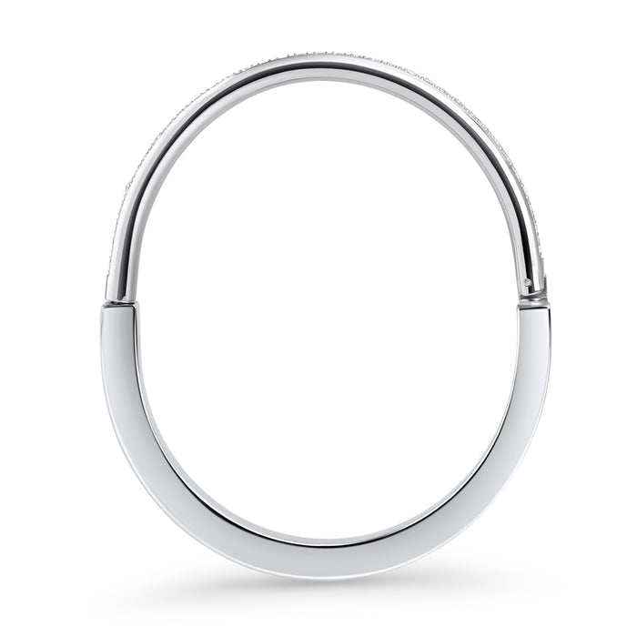 Silver stainless steel minimalist bangle bracelet, sleek modern jewelry design, hypoallergenic non-tarnish durable bracelet, elegant everyday stainless steel jewelry.