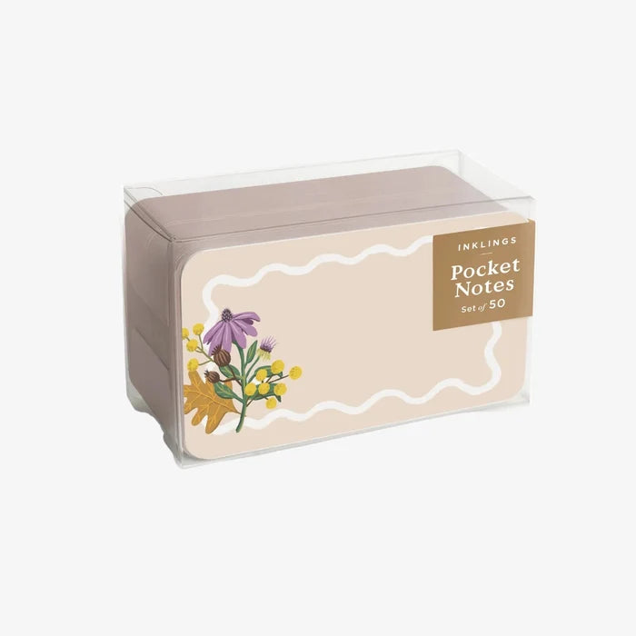 Box of pocket notes with floral design and 'Inklings' branding on a white background