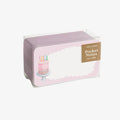 Box of pocket notes with a birthday cake illustration on a white background