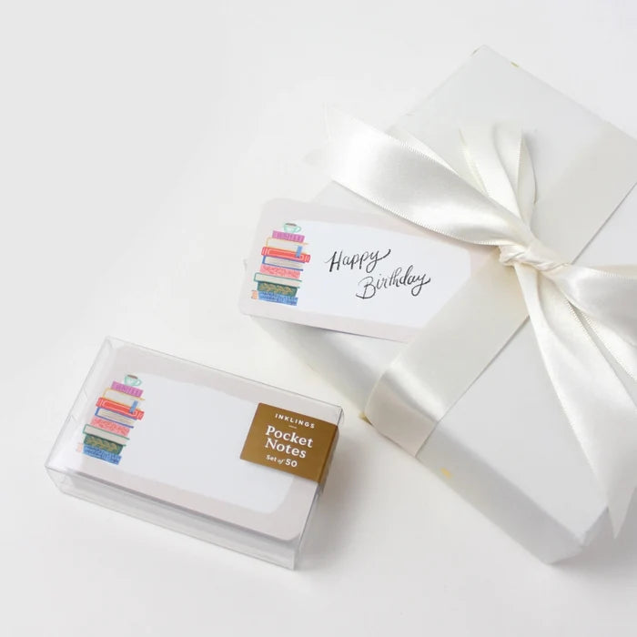 Packaged pocket notes with a 'Happy Birthday' card on a white background