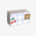 Box of pocket notes with cherry design on a white background
