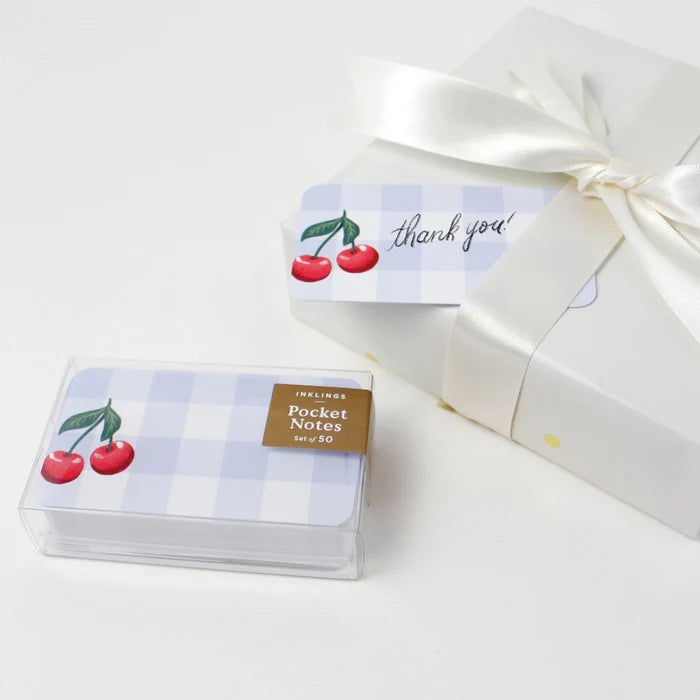 Pack of pocket notes with cherry design and 'thank you' label on a white background