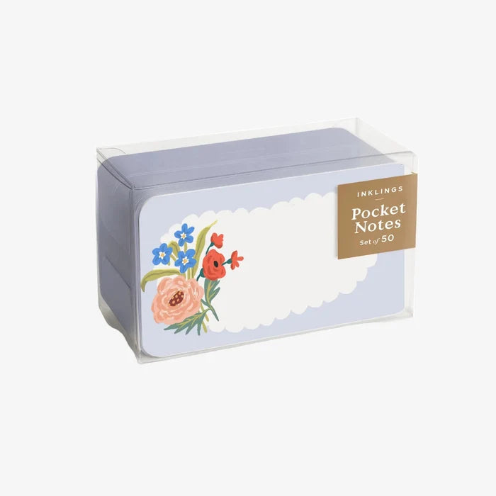 Pack of pocket notes with floral design on a white background